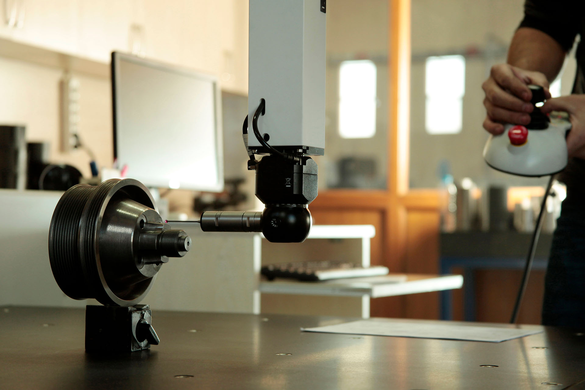 A coordinate measuring machine (CMM) in use for quality control at KeyPlastics